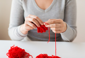 Image showing woman hands knitting with needles and yarn