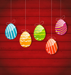 Image showing Easter three ornamental colorful eggs on wooden background