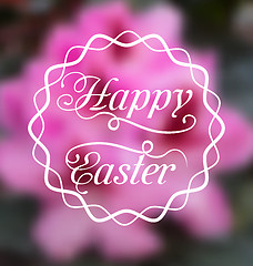 Image showing Happy Easter calligraphic headline, blurred background