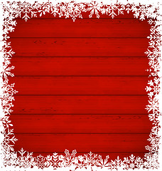 Image showing Christmas snowflakes border on wooden background