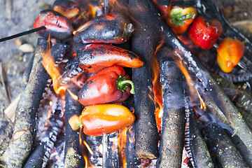 Image showing fried vegetables on a fire