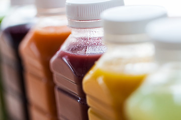 Image showing bottles with different fruit or vegetable juices