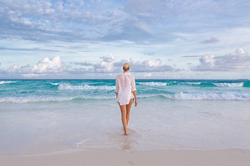 Image showing Woman on summer vacations at tropical beach of Mahe Island, Seychelles.