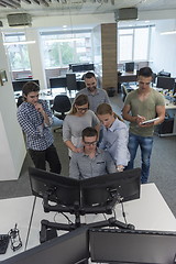 Image showing startup business people group working as team to find solution