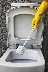 Image showing cleaning of white toilet bowl 