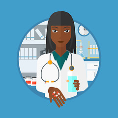 Image showing Pharmacist giving pills and glass of water.