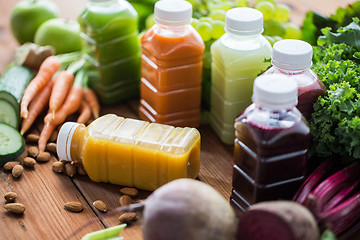 Image showing bottles with different fruit or vegetable juices