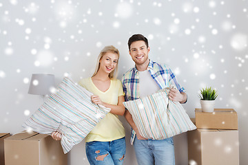 Image showing happy couple with stuff moving to new home