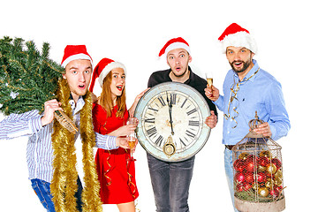 Image showing Many young women and men drinking at christmas party