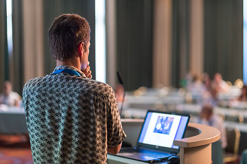 Image showing Public speaker giving talk at scientific conference.