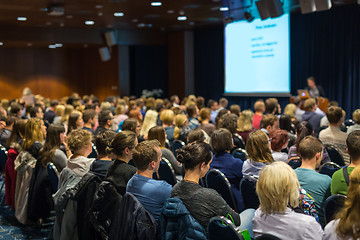 Image showing Audience in lecture hall participating at business event.