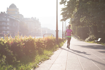 Image showing african american woman jogging in the city