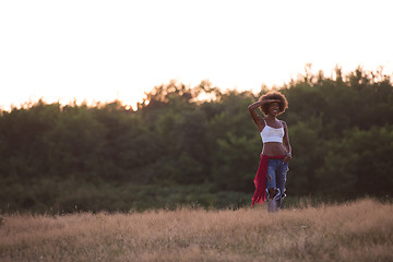 Image showing young black woman in nature