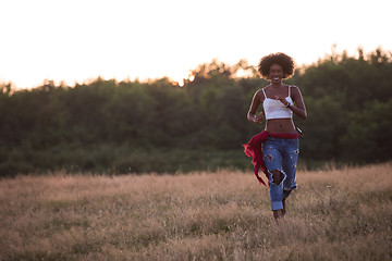 Image showing young black woman in nature