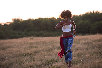 Image showing young black woman in nature