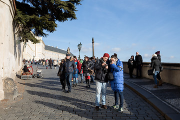 Image showing Tourists queue in front of the Prague Castle