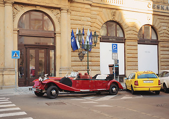 Image showing Famous historic red car Praga in Prague street