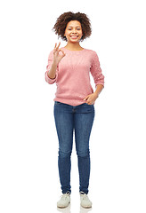 Image showing happy african american young woman showing ok sign