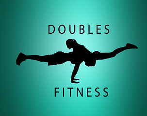 Image showing The silhouette of fit woman and man doing some push ups at the gym