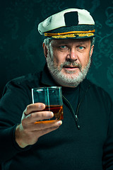 Image showing Portrait of old captain or sailor man in black sweater