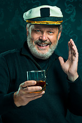 Image showing Portrait of old captain or sailor man in black sweater
