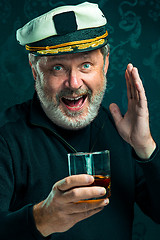 Image showing Portrait of old captain or sailor man in black sweater