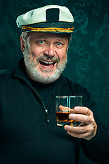 Image showing Portrait of old captain or sailor man in black sweater