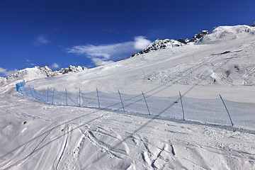 Image showing Ski track in sun winter day