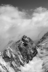 Image showing Black and white view on snow mountains in cloud