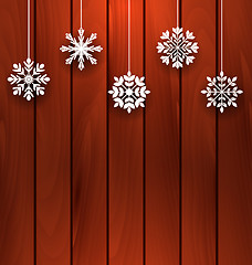 Image showing Wooden Background with Variation Snowflakes