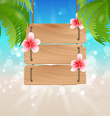 Image showing Hanging wooden guidepost with exotic flowers frangipani and palm