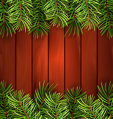 Image showing Holiday Wooden Background with Fir Branches