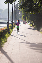 Image showing african american woman jogging in the city