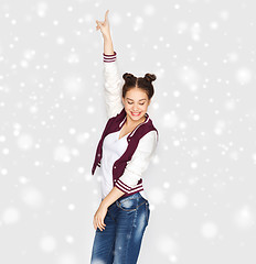 Image showing happy smiling pretty teenage girl dancing