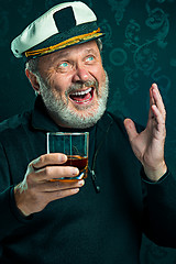 Image showing Portrait of old captain or sailor man in black sweater