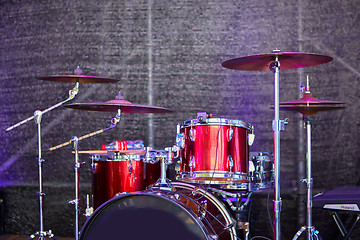 Image showing Modern drum set on stage prepared for playing.