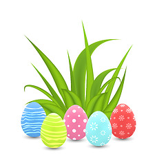 Image showing Traditional colorful ornamental eggs with grass for  Easter