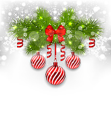 Image showing Christmas glowing background with fir branches, glass balls, rib