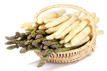 Image showing Basket of white and green asparagus