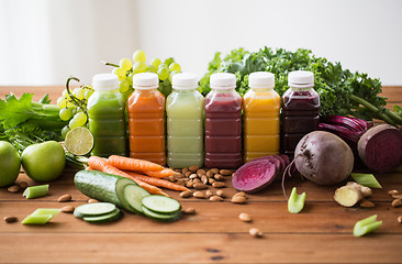 Image showing bottles with different fruit or vegetable juices