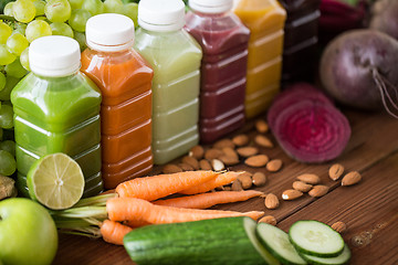 Image showing bottles with different fruit or vegetable juices