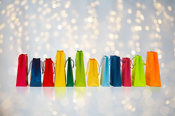 Image showing shopping bags over holidays lights background