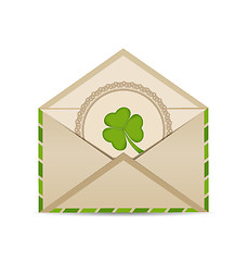 Image showing Open vintage envelope with clover isolated on white background f