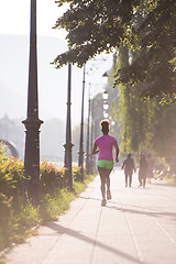 Image showing african american woman jogging in the city