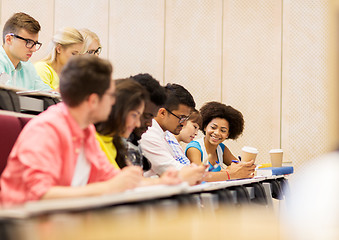 Image showing group of students with coffee writing on lecture