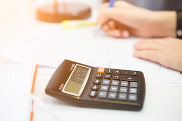 Image showing Calculator close up on desk