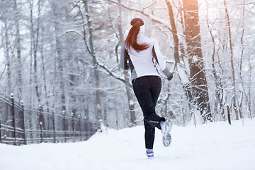 Image showing Sport woman jogging on morning