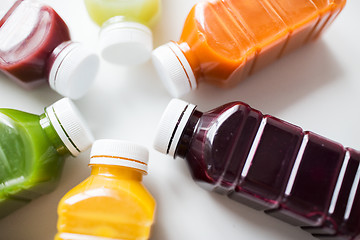 Image showing bottles with different fruit or vegetable juices