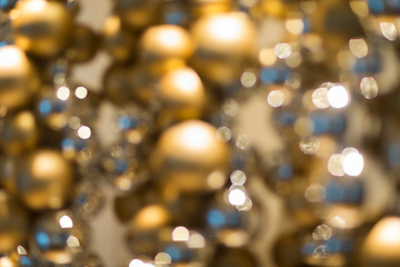 Image showing golden christmas decoration or garland of beads