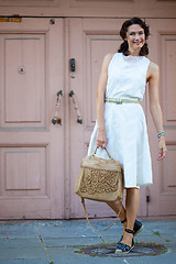 Image showing smiling beautiful woman in white dress